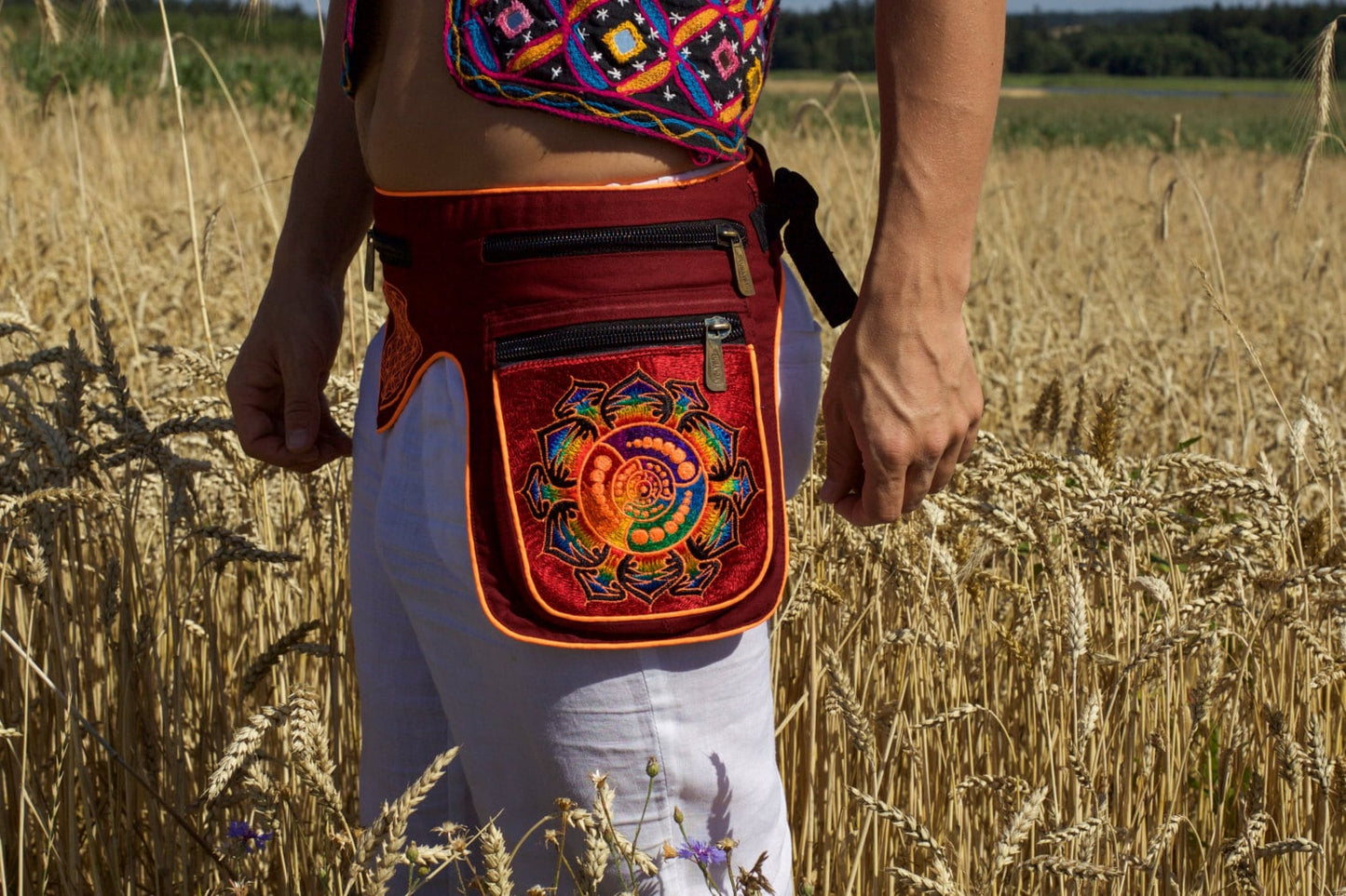 Beltbag Orange Attributes - 7 pockets, strong ziplocks, size adjustable - hook & loop and clip - blacklight active lines crop circle